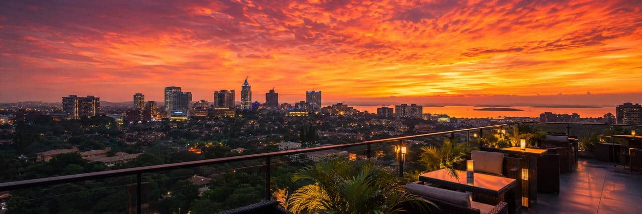 Kampala Uganda city skyline golden hour rooftop bar
